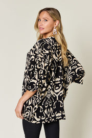 Double Take Full Size Printed Notched Half Sleeve Blouse
